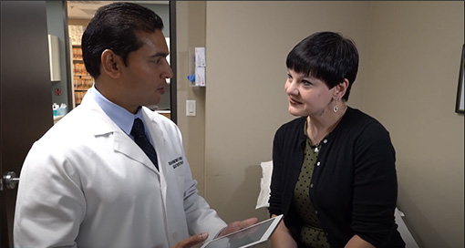 Doctor consulting with a patient in a clinic.