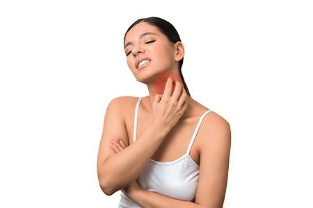 Woman touching her neck in discomfort.